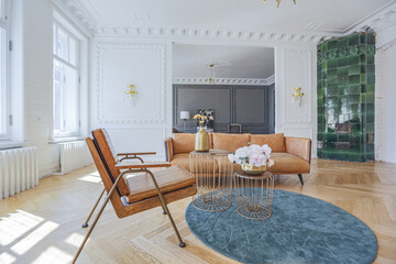 luxury interior of a spacious apartment in an old 19th century historical house with modern...