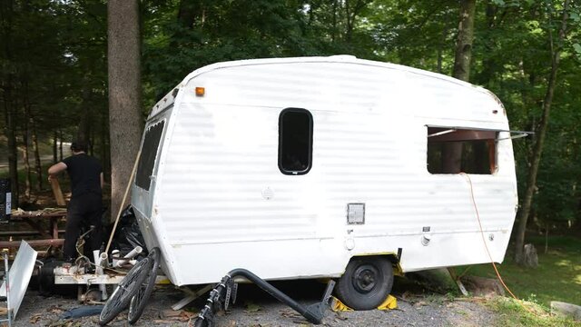 Rebuilding customized travel trailer into tiny house construction.