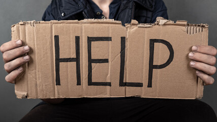 an inscription asking for help, day to help the poor.