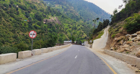 beautiful swat valley Pakistan mountains with green trees and grass water stream,natural landscape © Azeem