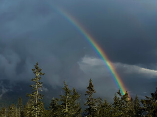 rainbow from a mountain cabin