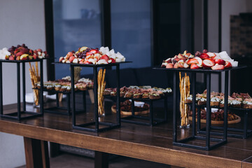 Delicacies and fruits on a buffet or banquet. Catering.