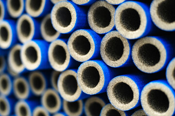 Foamed polyethylene pipe insulation. Trade in fittings for the installation of pipelines. Lots of amenities. Selective focus