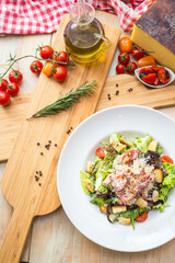 fresh salad on table with props
