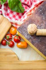 ingredients for pizza with props on table