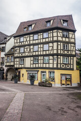 Traditional half-timbered houses in colorful romantic Colmar old town. Colmar is a charming town in Alsace, France.