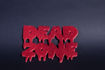 Dead Zone sign on black background