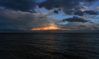 Clouds over the sea at sunset