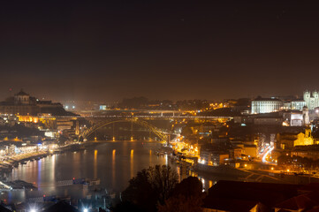 Fototapeta na wymiar Panoramic view on old part of Porto city in Portugal at night