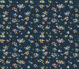Vintage floral background. Floral pattern with small colorful flowers on a dark blue background. Seamless pattern for design and fashion prints. Ditsy style. Stock vector illustration.