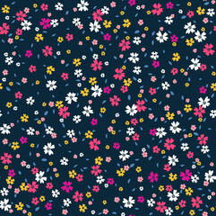 Fototapeta na wymiar Cute floral pattern in the small flowers. Seamless vector texture. Elegant template for fashion prints. Printing with small pink, white and yellow flowers. Dark blue background.