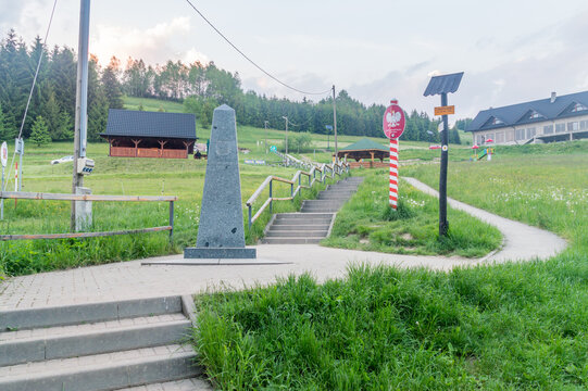 Jaworzynka, Poland- June 5, 2021: View on Polish border signs on Polish site of tripoint of Slovak, Czech, and Poland. Border of three countries.