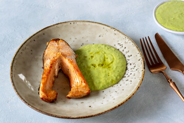 Trout with mashed young green peas.