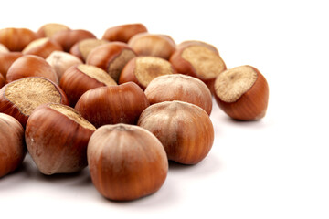 Group of hazelnuts, isolated on white background