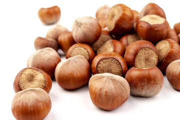 Group of hazelnuts, isolated on white background