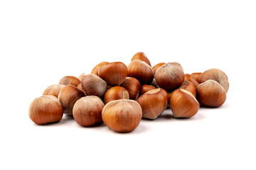 Group of hazelnuts, isolated on white background