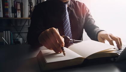 Business and lawyers discussing contract papers with brass scale on desk in office. Law, legal...