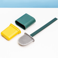 Silicone toilet brush with plastic stand. Concept of household goods