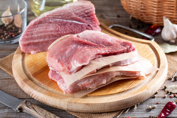 Raw frozen meat. Raw pork chops