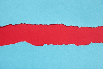 Red hole with ragged edges in turquoise paper. Header mock up background