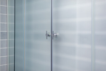 Doors to the shower cubicle in the bathroom.