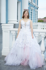 Girl with Down syndrome in  wedding dress.