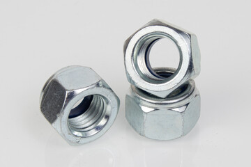 Hardware nuts on a white background