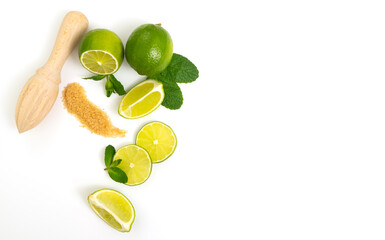 Mojito ingredients. Lime, mint and cane sugar isolated on white background.