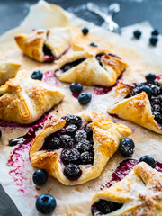 Blueberry cakes on baking paper