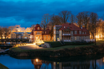 Kuressaare, Estonia. Old Wooden Mansion Ekesparre Boutique Hotel In Wooden Art Nouveau In Evening Blue Hour Night