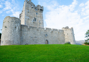 Fototapeta na wymiar Ross Castle , medieval stone castle on small green rise