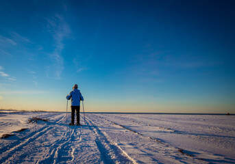 Fototapeta na wymiar person snowshoeing in Prince Edward Island 