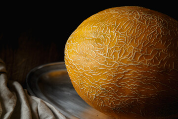 Melon, honey melon on wooden table background.