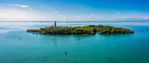 Aerial view of the plagued ghost island of Poveglia in the Venetian lagoon, opposite Malamocco...