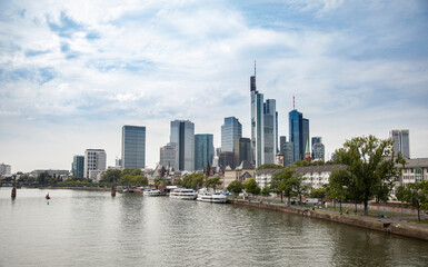 Fototapeta na wymiar Panoramic view of Frankfurt, Germany with the Main river in the foreground