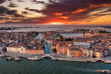 Fototapeta premium Aerial panoramic view of iconic and unique Campanile in Saint Mark's square or Piazza San Marco, Venice, Italy