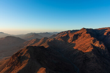 Naklejka na ściany i meble Sunrise over Mount Sinai, view from Mount Moses
