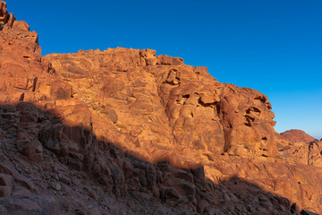 Fototapeta na wymiar Sunrise over Mount Sinai, view from Mount Moses