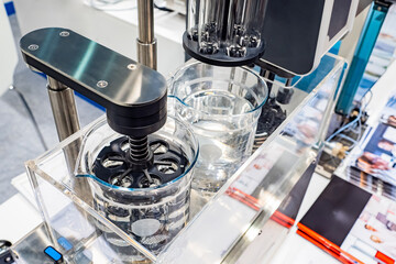 Electronic equipment in laboratory. Equipment for medical research. Devices with glass flasks in...