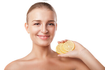 Young beautiful woman with lemon over white