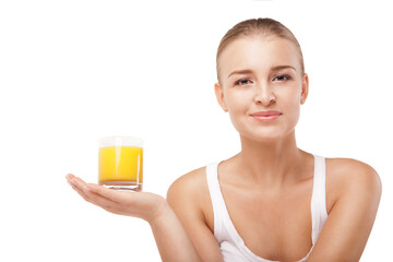 Young woman with a glass of orange juice isolated
