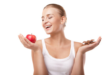 Woman holding apple and chocolate isolated