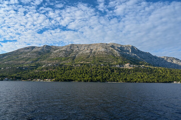 View on Peljesac peninsula from a boat. Adriatic sea, Dalmatia, Croatia.