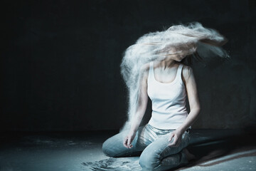 Emotional Wild Woman with Flying hair and ashes