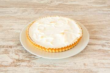 Super succulent lemon tart complete with flambé cream on top