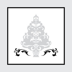 An ornate damask Christmas tree in black, gray, and white
