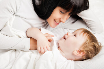 baby girl is playing with educational toys