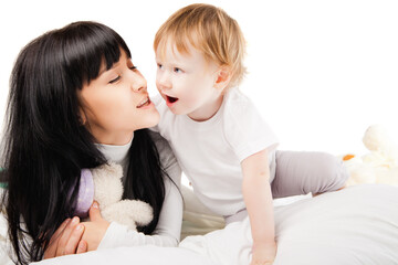 happy family. Mother with baby playing and smiling