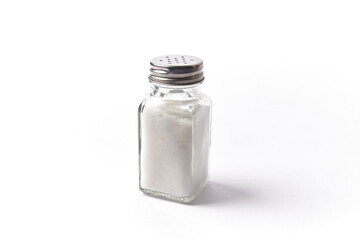 salt shaker isolatated on white, sodium container used for spice the food with a condiment with...