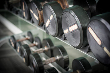 Naklejka na ściany i meble dumbbell weights in gym